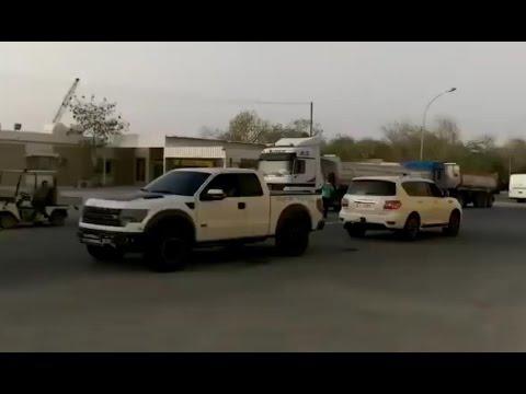 Nissan Patrol vs Ford F-150 Raptor SVT Nissan Patrol vs Ford F-150 Raptor SVT