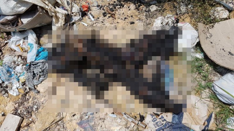 Обугленное тело женщины на свалке Обугленное тело женщины на свалке