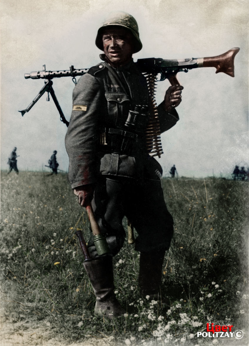 Немецкий пулемётчик с MG-34