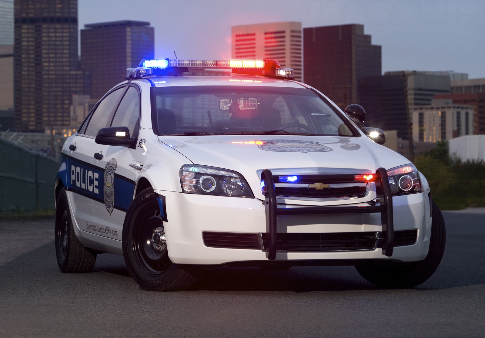 Полицейская машина другая. Chevrolet Caprice 2015 Police. Полицейская машина Шевроле Авео т300 с мигалками. Полицейская Шевроле Лачетти.