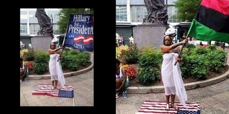 Женщина агитирует за Хиллари Клинтон, стоя при этом на флаге Америки? Что?