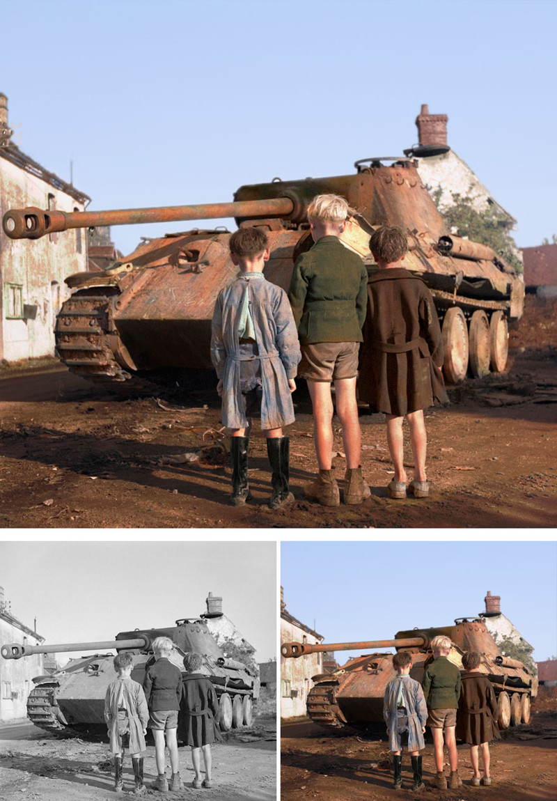 Три французских мальчика смотрят на немецкий танк