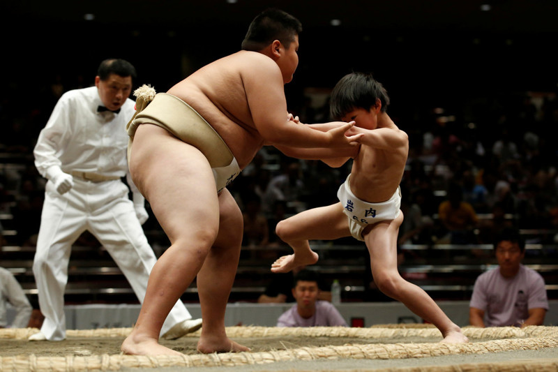 Детский турнир сумо в Токио, Япония, 30 июля 2017 года. (Photo by Kim Kyung-Hoon/Reuters)
