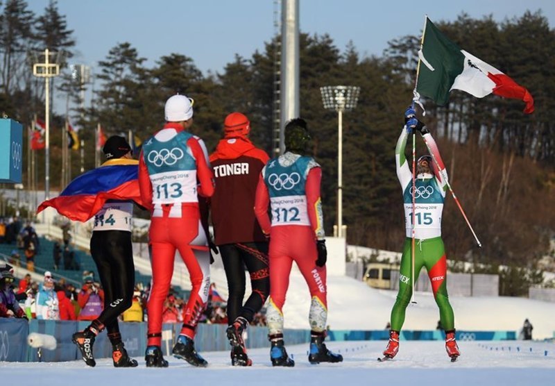 Мадрасо закончил 15 километров свободным стилем с флагом в руках