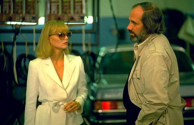 Мишель Пфайффер и режиссер Брайан Де Пальма на съемочной площадке "Лицо со шрамом" (Scarface) (1983).