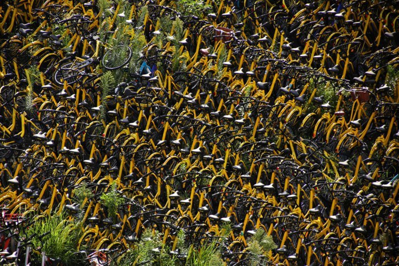 Китайские велосипедные кладбища: визуальная история странной деловой неудачи