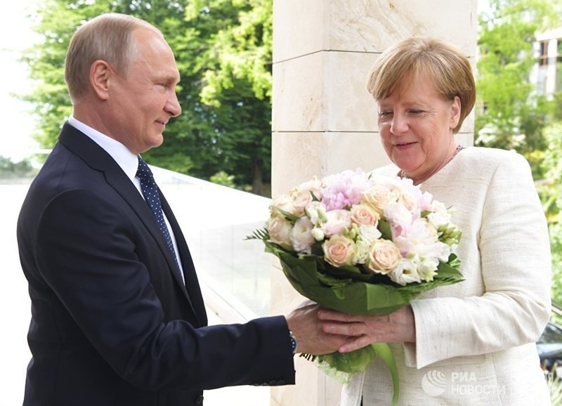 Встреча Владимира Путина и Ангелы Меркель взбудоражила западные СМИ