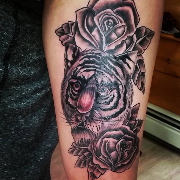 Наверное, татуировщик плохо представляет себе, как выглядят тигры