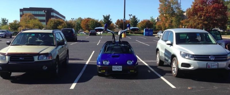 Mazda Autozam AZ-1: маленький двухместный спортивный автомобиль с "крыльями чайки"