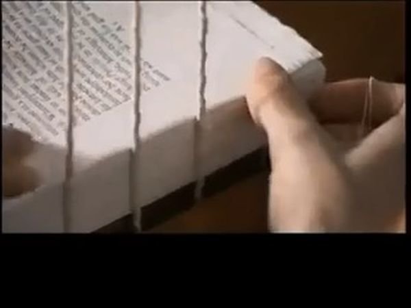 Сложенные в книгу листы прошиваются и прикрепляются к переплетной крышке из плотного материала