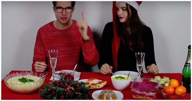 Немцы пробуют блюда с русского новогоднего стола