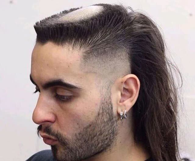 Над причёской этого парня явно трудился настоящий волшебник