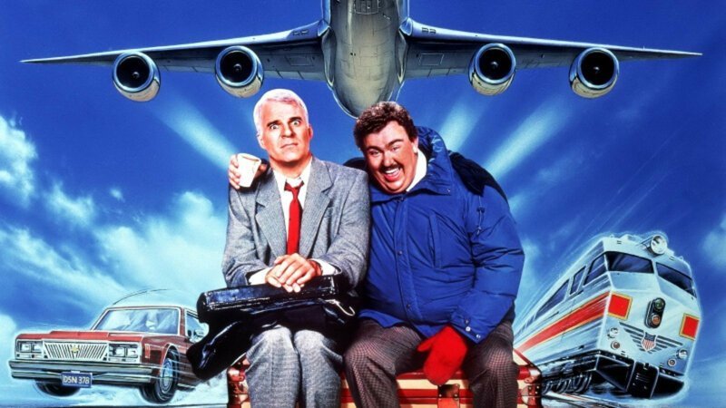 "Самолетом, поездом, машиной" (Planes, Trains & Automobiles)  1987 США , в гл. ролях : Стив Мартин , Джон Кэнди