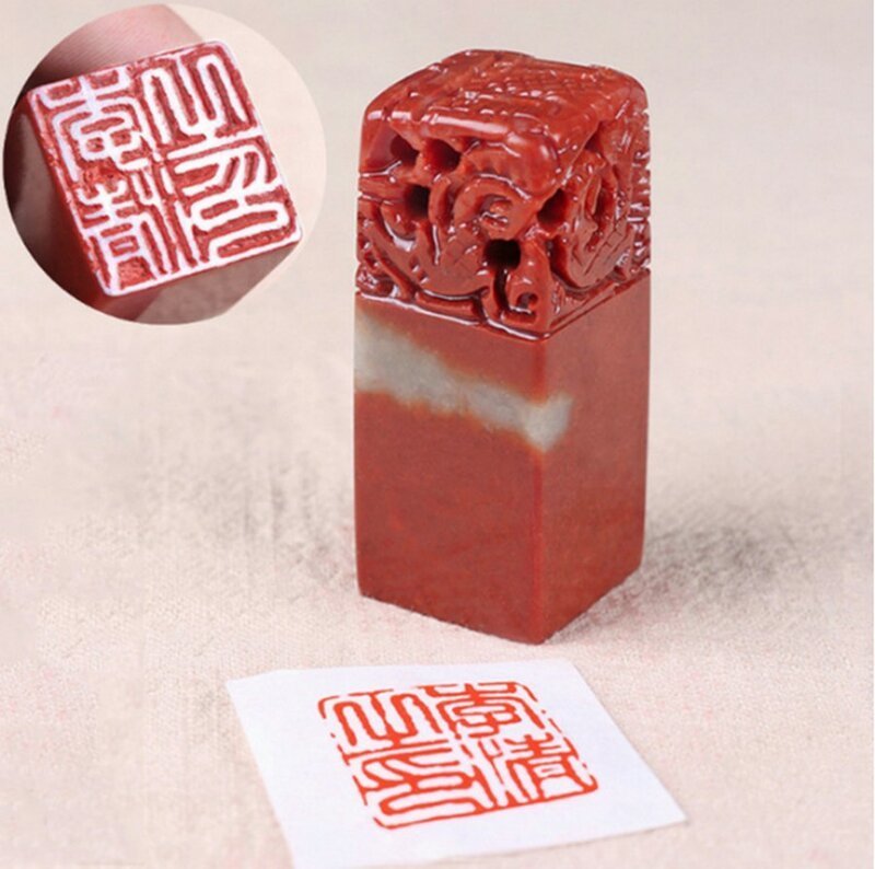 Обычная китайская печать. В камне вырезают нужные иероглифы - а дальше все просто 