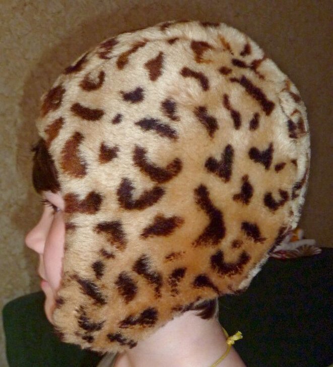 Тигровая шапочка-шлем, сберегла не одну "светлую голову"