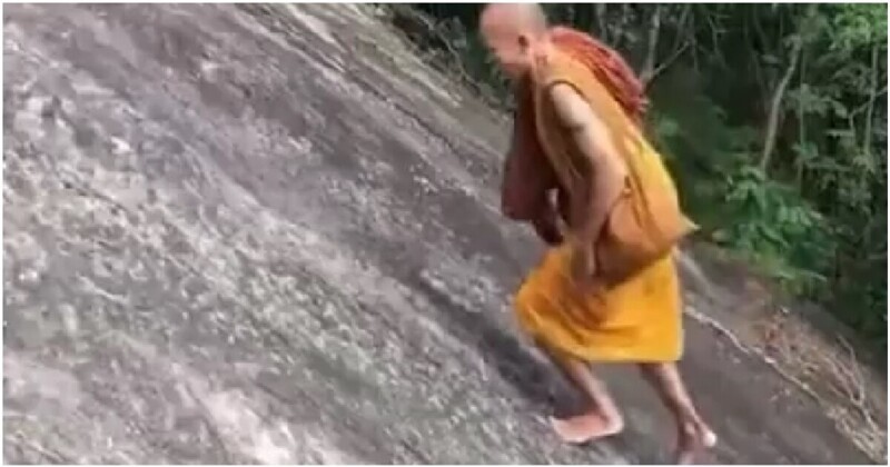 Монах продемонстрировал впечатляющие навыки скалолазания