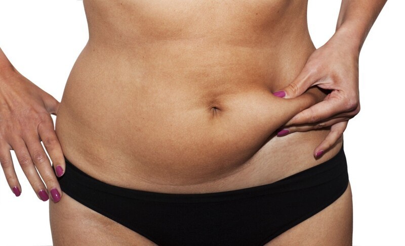 Как образуется лишняя жировая ткань на животе и боках?