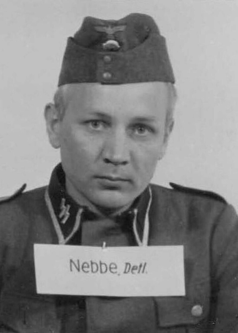 Детлер Неббе, бывший коммерсант. Член СС с 1933-го, дослужился до высшего не-офицерского чина гауптшарфюрера