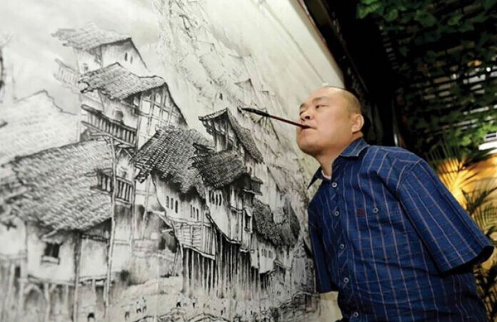 Хуан Гофу потерял обе руки, но это не остановило его на пути к мечте, и он научился рисовать ртом и ногами