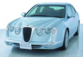 И вот ещё одно чудо которое можно было сюда внести Mitsuoka Ryoga.Хотя салон в нём хорош и современен.