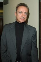 Немного на Udo Kier похож:
