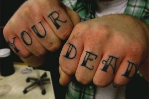 Откуда автор знает, что именно хотел написать владелец тату? Ваш мертвец, либо вы мертвец?