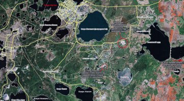 Автор, учи мат.часть!!! Озеро Карачай находится на территории промплощадки химкомбината ПО «Маяк», а не высоко в горах, как у тебя на фото!!! И выглядит оно вот так: