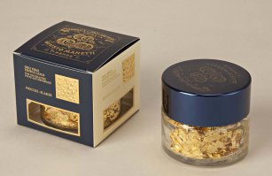 обычное пищевое золото. просто не так оно распространено у нас. я только шоколад видела с серебром и золотом. на вкус - никак. только для красоты.