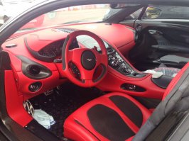 По поводу Aston Martin One 77
Справка:
Aston Martin One-77 — Всего выпущено 77 экземпляров. Все One-77 были распроданы ещё за год до премьеры. Стоимость порядка 1,5 млн евро. 12-цилиндровый V-образный атмосферный двигатель объёмом 7,3 литра, мощностью 760 л.с. и 750 Н·м крутящего момента, является самым мощным в мире безнаддувным двигателем на сегодняшний день. C 0 до 100 — за 3.7 сек. Максимальная скорость — 354 км.ч)
Из тех что я видел.
один - красного цвета в Дюссельдорфе (Германия)
один (самый последний в серии 77/77 - болотного цвета в Астане (Казахстан).
один в Москве. К тому же самый первый о чем свидетельствует шильдик на пороге машины.
Фото с Московской таможни года 1,5 назад.