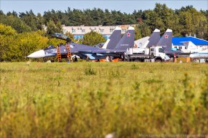 Сомневаюсь, что это морские Сушки. По форму и раскраске больше похоше на новенькие Су-35с... Тем более какой МАКС без них?