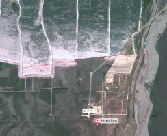 21 км юго-западнее Нарвы - болота Пухату. Рядом с расчетной точкой что-то типа карьера... Технически если место захоронения приметно (памятник), то должно быть известно, еже ли нет...