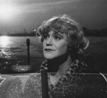 На заглавной фотке, показалось что это мужик переодетый  И даже знаю, на кого похож