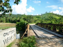 Вот вам пример из жизни. Еду, никого не трогаю, и тут такой мост. Дорога одна, другой нет. Что делать?

P.S. Если разогнаться - нагрузка будет только больше, а ломается он все-равно быстрее, чем ты едешь. 

P.P.S. Потом видел как по нему автобус проезжал.