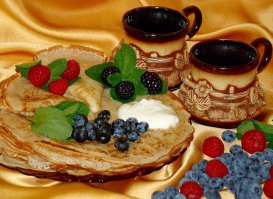 А по мне так очень даже аппетитно выглядит, хот лично я фанатка русской кухни...))) блины, горячий чай...