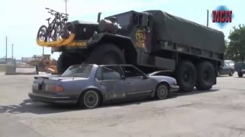 "Учитывая, что в последнее время стало популярным приобретать списанные военные бронированные автомобили, стоит представить каково на них застрять в пробке......"

Можно представить что так....