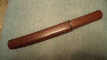 Кури бамбук и вики, проверяльщик хренов. 
И согласно твоим профи вот эта катана, которая режик танто, тоже сабля.

А вот длинный меч из пары дайсё, который кунъёми, это всё таки меч.