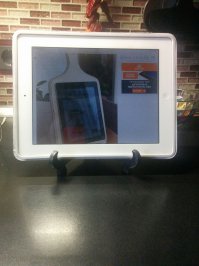 Для планшета использую старую подставку для декоративной тарелки.Удобно.