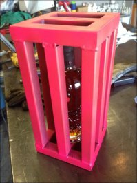 Открываем бутылку (если не достать руками - можно длинными пасатижами), вставляем в неё трубку от капельницы, ставим бутылку повыше, другую, пустую бутылку - ниже. Далее как с переливанием бензина из старой классики.
То чувство, когда ты - инженер :)