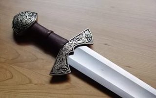 Тащемта, сначала тоже повелся на "исключительно увеличение жесткости", но посмотрел некоторые мечи - реально дол в 2/3 от широченного лезвия - такая гигантская его ширина снимет очень много веса. Да и какая жесткость дается? только вверх-вниз, а там и так закалка есть у лезвий, все, что могло повести, уже повело на этапе закалки, а если нужно делать жесткость курсовую (влево-вправо) то это надо делать "долы" вместо лезвий, но чем тогда рубить. В общем уменьшение веса делает меч дешевле, а фехтование легче. Ну и про баланс, автор говорит, что дол идет по всей длине, поэтому не влияет - ага, а по рукояти он идет?) Если хоть 200-300 г. снято с 1,5 кг, то это очень много переносит на рукоятку, соответственно можно точнее им крутить. 
На фото меч викингов 10-й век (в смысле им не только викинги рубились, но по эпохе так назван).
Ну и про двутавр - на самом деле сплошной квадрат 25 на 25 см будет попрочнее 25-го двутавра, но тяжелее раз эдак в дцать, поэтому двутавры используют.