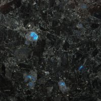 Будете гулять по городу - присматривайтесь к чёрным плитам облицовки старых зданий, каменным ступеням в подземных переходах и т.п. Материал, из которого они вырезаны, может оказаться лабрадоритом - магматической породой, включающей кристаллы лабрадора.