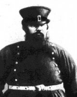 "На фото Петр Вениаминович Кивелиди"

Т.е. на фото 1794 года столичный градоначальник, переодетый в форму извозчика второй половины XIX в.