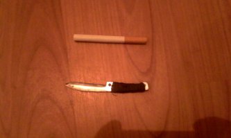 Хрен пойми что за железка,нитка,воск. 
фоткал на зажигалку