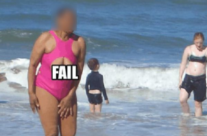 Всё просто. Она его надела задом наперед. Вырез должен быть на спине.