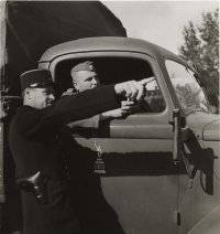 Судя по кобуре пистолеты у них не отнимали.