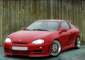 У нас в Риге есть фирма, которая покупает авто в любом состоянии. Короче знакомый мужик сдал свою Мазду Mx-3 1996 года за 100€. Правда с нуля он естественно её не брал. Взрослая дочь почти подарила, за 300 евро. Потерял работу, денег не осталось, а мне сволочь не позвонил. Я бы и за 200 взял её. Сам на ней покатался, потому что он умудрился по пьяне разбить фару прямо во дворе, а "добрые" соседи вызвали полицию. Лишили прав, вот я с ним за рулём и катался. Так я к чему, фирма покупает у владельцев авто, называет цену, в зависимости от года выпуска и состояния. Ну вот эту, ещё можно сказать красавицу он и продал им за стольник мудак. А мы до этого с ним заменили передний бампер, верхний лючок (не работал) акум и музон.(естественно за его деньги). Жалко тачку. Я бы её ещё подделал и сам бы ездил. осталось только две фотки, когда полетел на трассе ремень генератора. Ставили на хуторе.