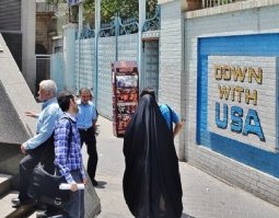Наглядная агитация в доступной для обывателя форме, смотрю, присутствует - прямо как у нас: на первой фото на стене заботливо и аккуратно выведено "Долой США!". Ещё только "Обама - чмо" не хватает...