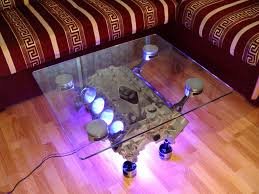 Стол будет неустойчивый на 3 опорных колёсах и учитывая вес при падении может травмировать находящихся рядом. Болты крепления столешницы лучше сделать потайными или приклеить её. Мне больше понравился такой вариант: