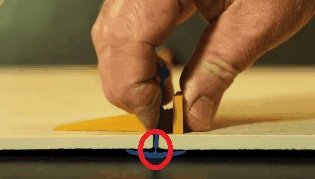 Думаю эта хреновина должна легко отламываться, учитывая утончение на стыке: