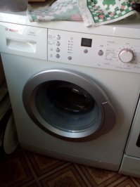 Моя на фото ниже. На фото выше - Индезит, а Вы видно в стиралках понимаете меньше меня :)