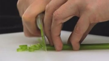 нужно просто привыкнуть резать, подгибая пальцы левой руки так, чтобы нож скользил не остриём по ногтю, а боковиной по костяшке. Все профессиональные повара делают именно так.